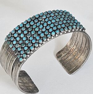 1920s Zuni Sterling Silver Turquoise Snake Eye 7-Row Cuff Bracelet – 119 Stones